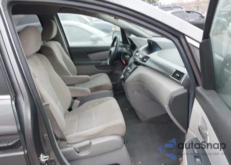 2012 Honda Odyssey Lx z USA, uszkodzony, nr VIN 5FNRL5H20CB145689